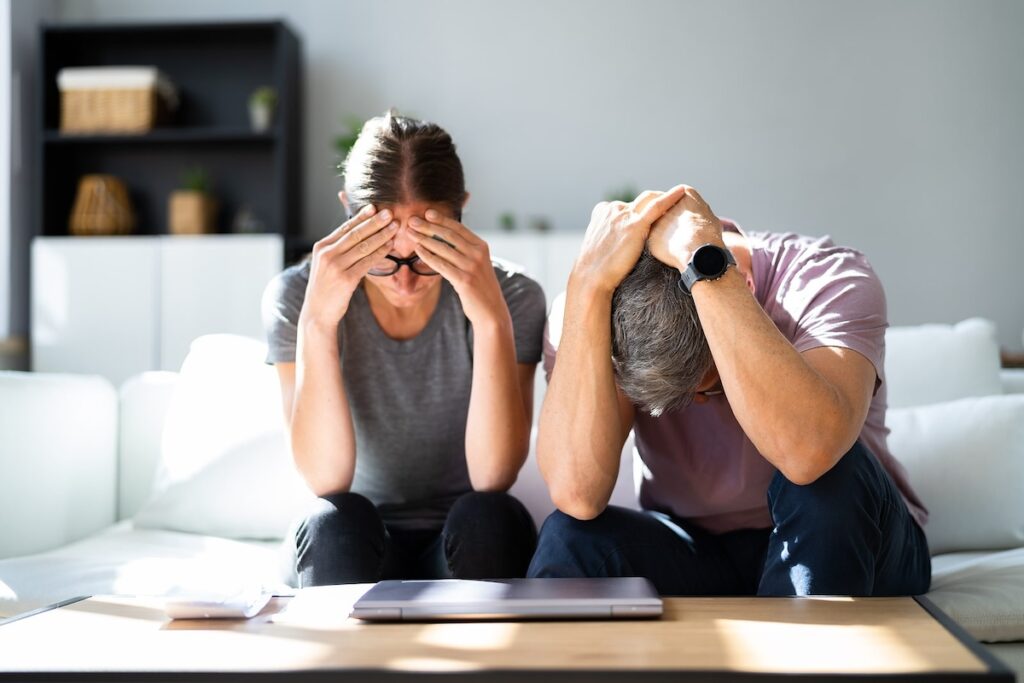 Unhappy Couple In Debt. Family And Money Stress